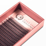 Eyelash packaging with 'Eyelash Excellence' branding on a white background