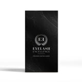 A tall black rectangular box with a subtle marble pattern and a silver 'EE Eyelash Excellence' logo, shown on a white background with a soft shadow.