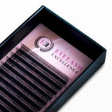 Eyelash extensions in a 'Eyelash Excellence' box on a white background