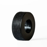 Black textured lash tape on a white background