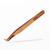 Gold Boot Volume Tweezers with geometric pattern on a white background