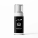 Eyelash Excellence foaming cleanser bottle on a white background