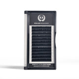 Eyelash packaging with 'EYELASH EXCELLENCE' branding on a white background