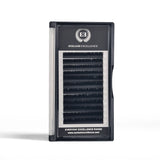 Eyelash packaging with 'Eyelash Excellence' branding on a white background