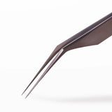 Close-up of extra long tipped tweezer on a white background