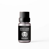 Eyelash Excellence primer bottle on a white background