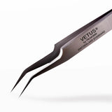 Pair of Vetus tweezers on a white background